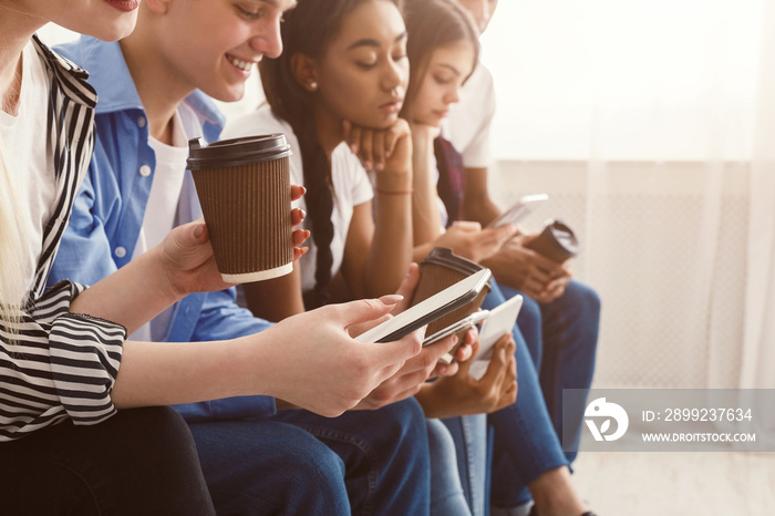 Teenagers using phones, chatting in social networks