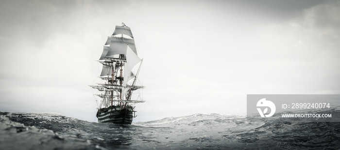 Pirate ship sailing on stormy ocean.