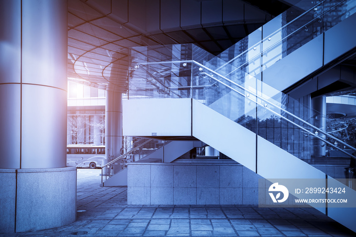 A staircase with a blue background