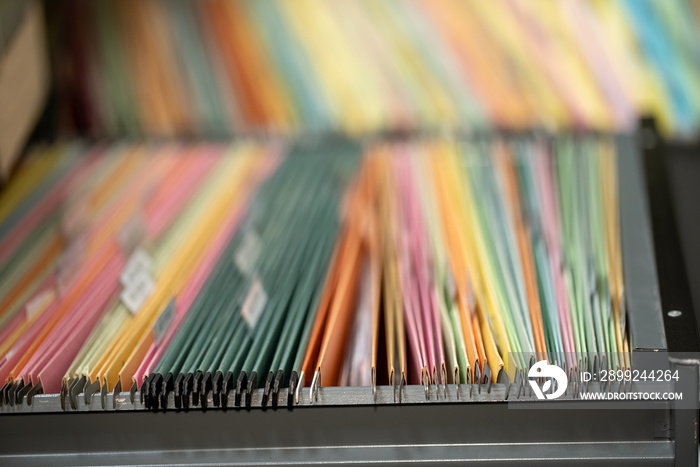 Paperwork business and file documents in the filing cabinet. Concept work in office.