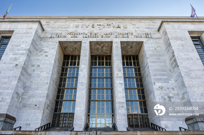 Façade of Milan Courthouse, house of the Milan Tribunal and the appellate court, built in early 20th century in  Italian 900s  style, Milan city center, Lombardy region, Italy