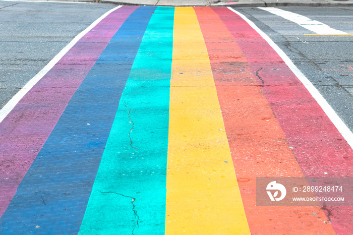 Rainbow colors in city crosswalk, Toronto, Canada