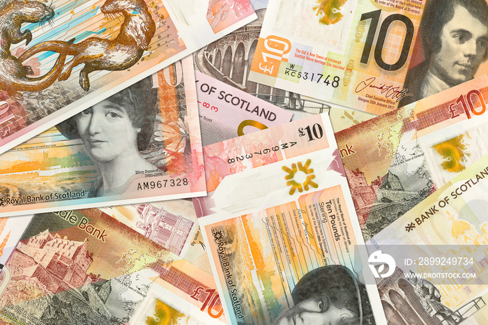 some different 10 Pounds Sterling banknotes issued by Scottish Banks