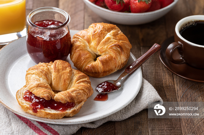 Croissants with strawberry preserves