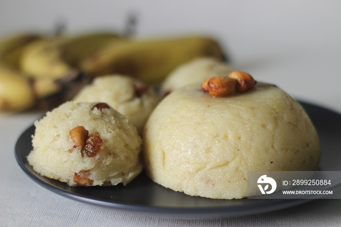 Semolina banana pudding. A fluffy Indian pudding made of Semolina, ghee, sugar, bananas and garnished with cashews. Locally known as banana sheera.