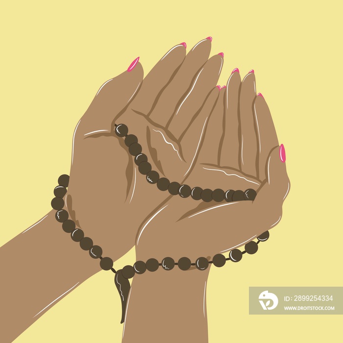 Two hands praying with beads