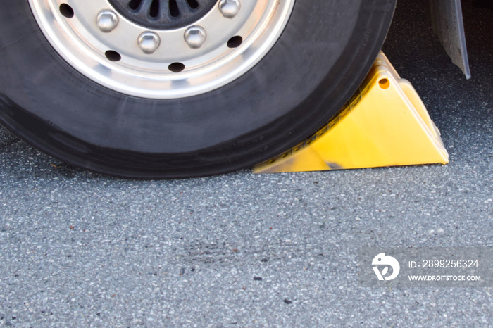 Wheel chocks. Device for safe parking of a truck.