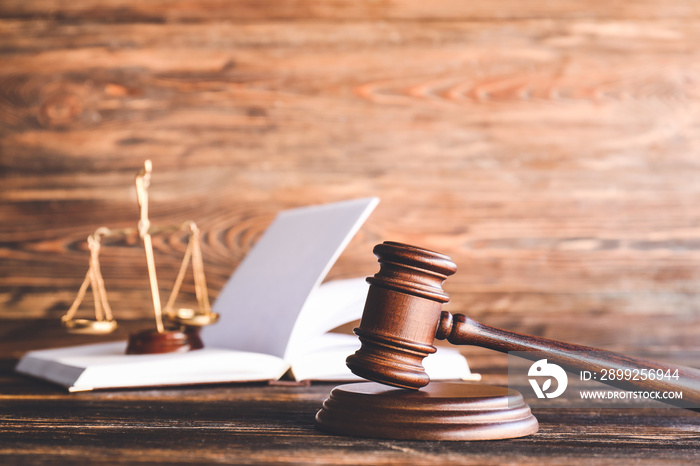 Judge’s gavel on wooden background