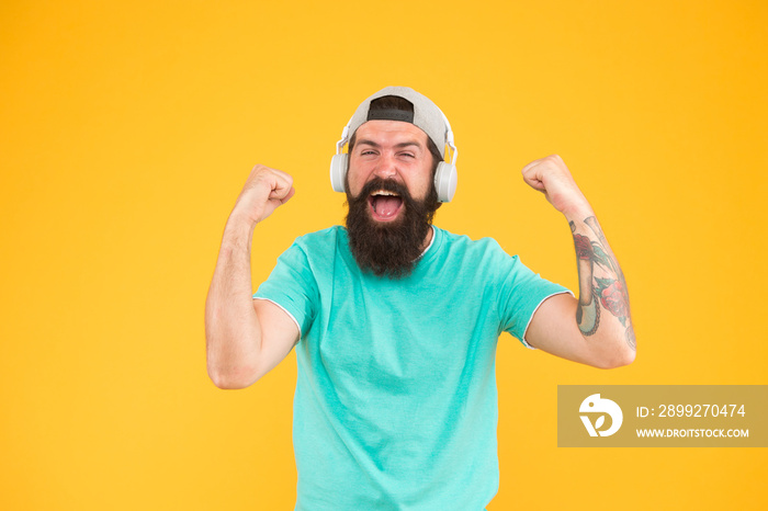 Equalizer player settings. Bass low sound. Hipster headphones gadget. Inspiring song. Music library. Feel rhythm. Bearded guy enjoy music. Lifestyle music fan. Man listening music wireless headphones