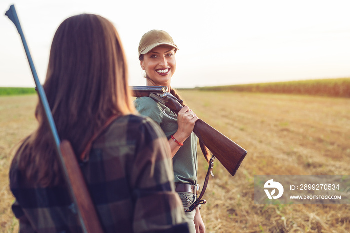 Two friends hunting watching wild.