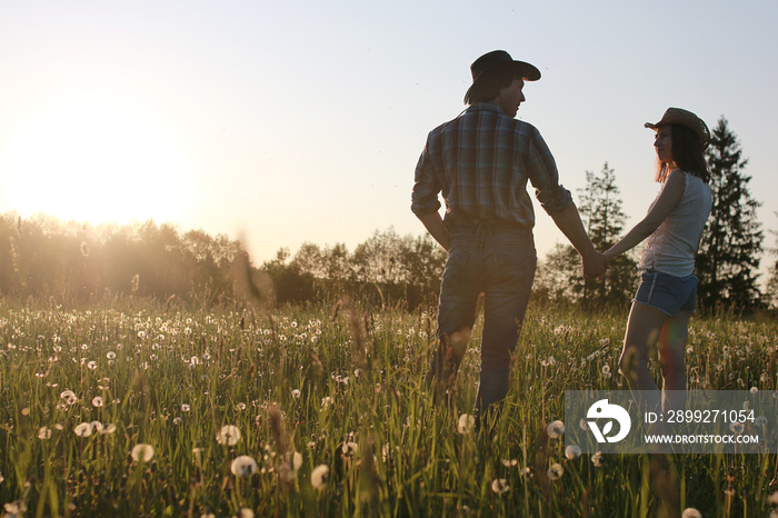 Cute couple on a walk by the countryside