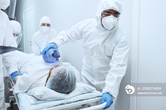 Doctors give resuscitation to a male patient in the emergency room