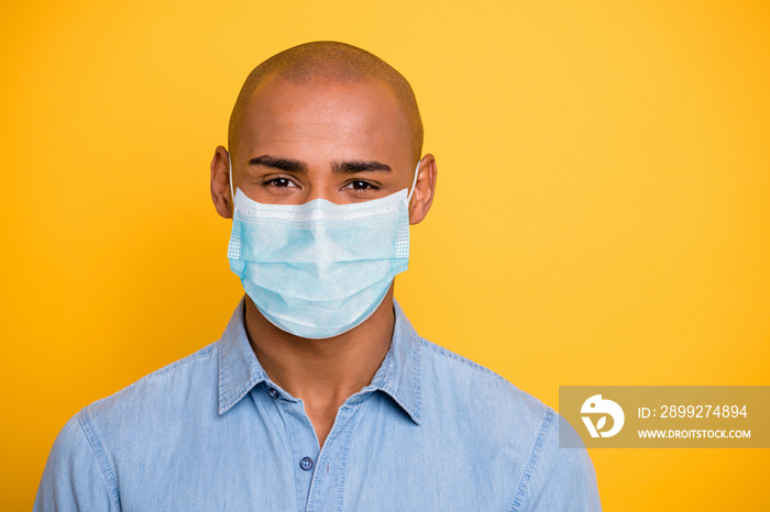 Close up photo of toothy dark skin macho positive good mood wear jeans denim shirt protective flu cold infection facial mask isolated bright yellow background