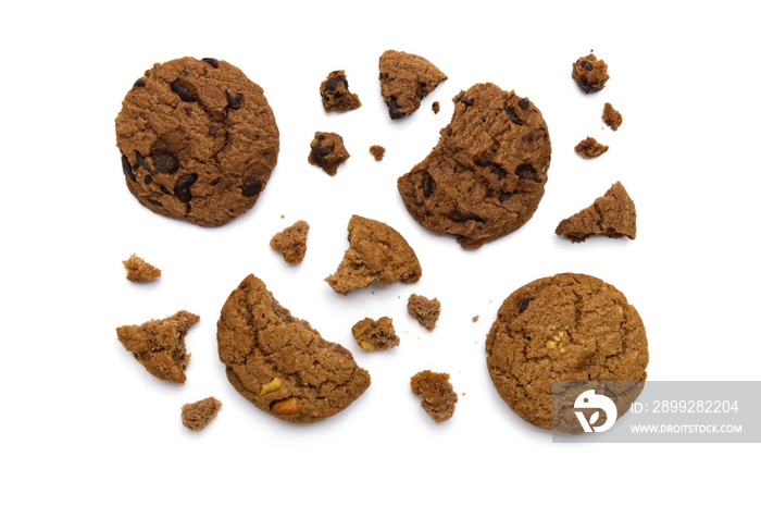 Chocolate chip cookies and crumbs on white background and Top view.