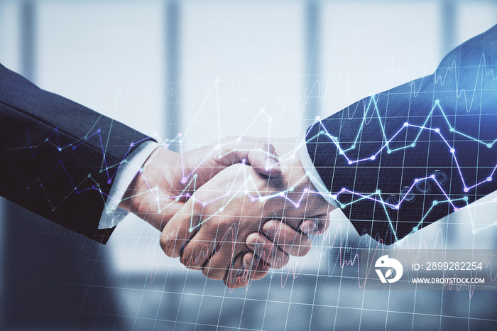 Double exposure of forex graph hologram and handshake of two men. Stock market concept.