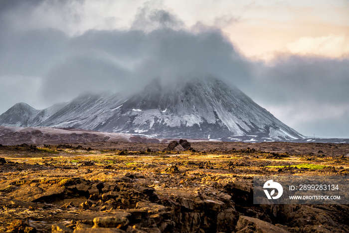 Volcanic cone and cracked lava field in northern Iceland