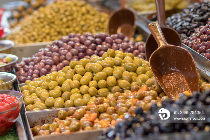 Olives. Of all varieties and in all shapes! Blacks, greens, bigs, little ones, Syrians, Arabs, bloody, conquered, and skulls. Kosher Food, Mahane Yehuda Market, Jerusalem, Israel.