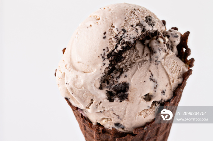 Cookies and cream ice cream in chocolate waffle cone