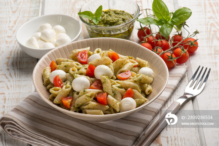 cold pasta salad with mozzarella and pesto sauce