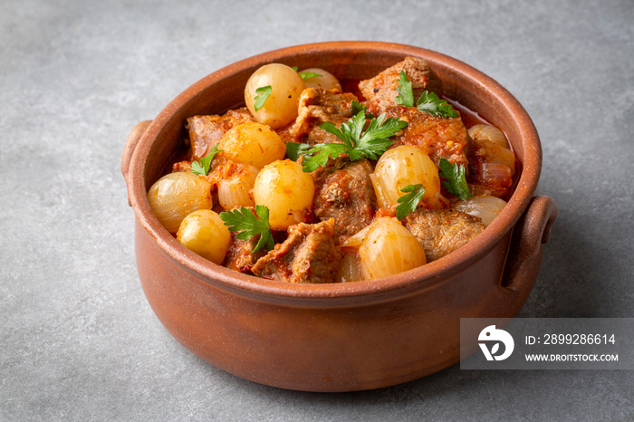 Traditional Greek dish of beef stifado in a sauce. Meat stew, onion stew. Turkish name; sogan yahni or et yahni