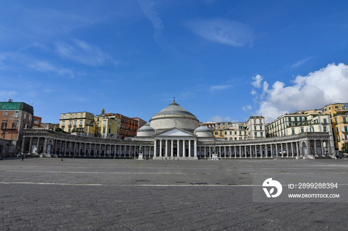 View of the square called Plebiscito with the facade of the cathedral in Naples, the capital of the Campania region, Italy.