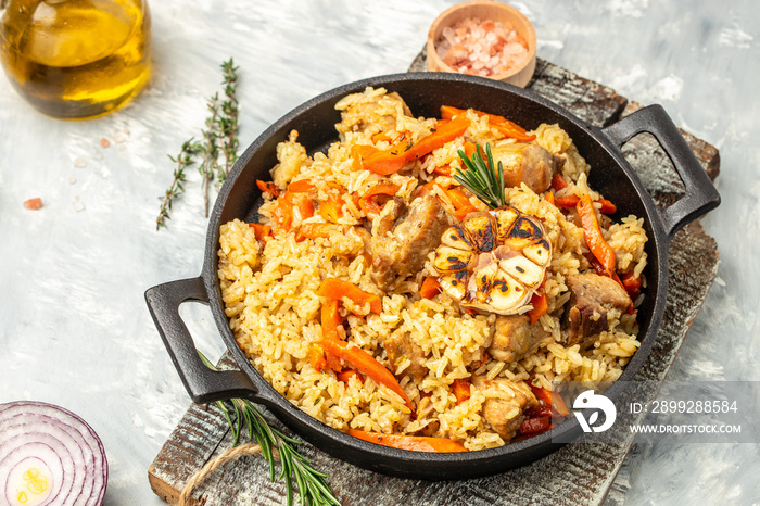 pilaf. Traditional oriental dish of boiled rice, meat, vegetables and spices. Restaurant menu, dieting, cookbook recipe top view