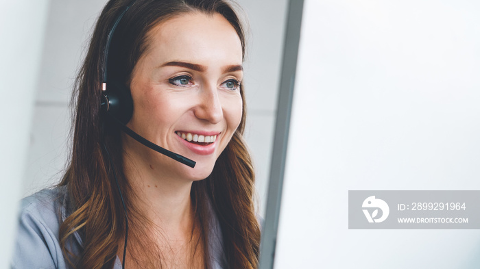 Business people wearing headset working in office to support remote customer or colleague. Call center, telemarketing, customer support agent provide service on telephone video conference call.