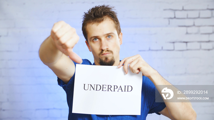 Unhappy underpaid man