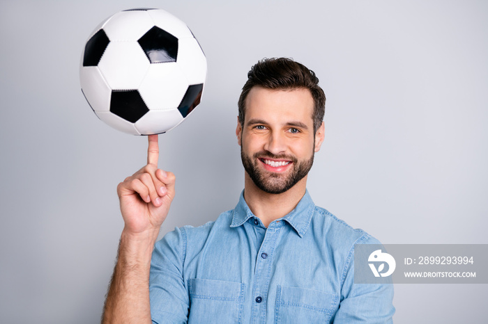 Close up photo amazing macho he him his guy show hand arm finger hold football leather ball round moves show cool tricks wear casual jeans denim shirts outfit clothes isolated light grey background