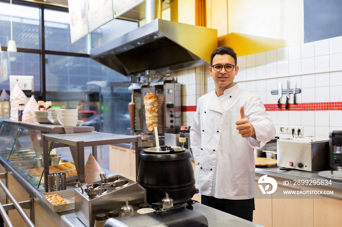 chef at kebab shop showing thumbs up