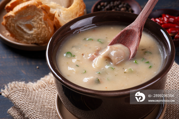 Delicious dish of Brazilian cuisine called Caldo de Mandioca. Made with cassava and meat