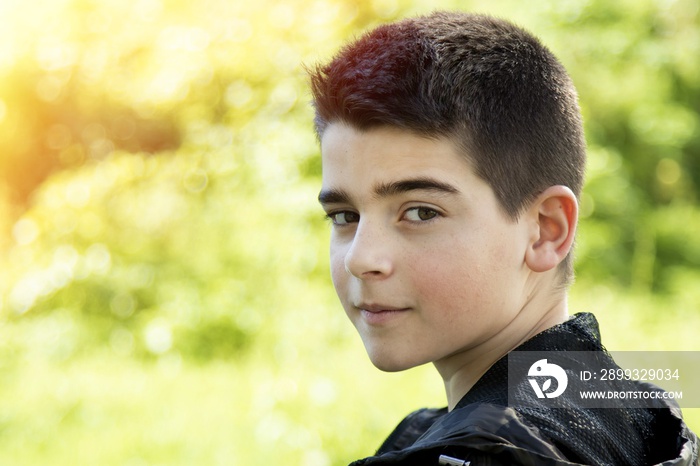 young boy portrait outdoors