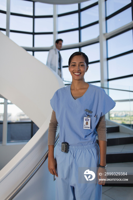 Portrait confident female nurse in scrubs