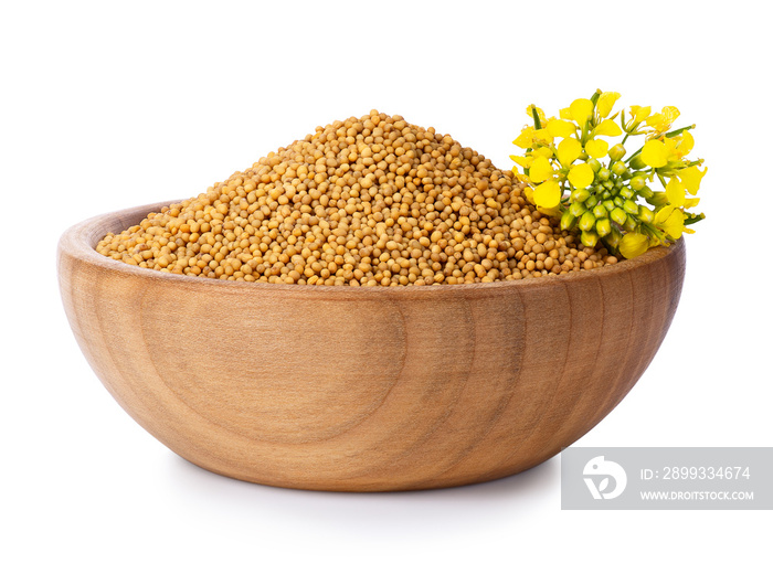 mustard seeds in wooden bowl