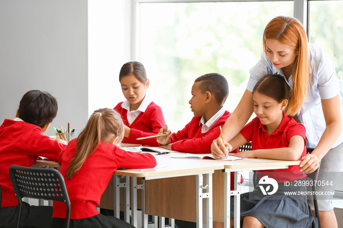 Teacher conducting lesson in classroom