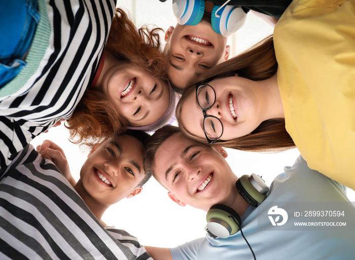 Portrait of teenagers on white background, bottom view