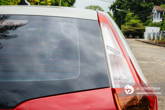 Back view of red car window for sticker mockup