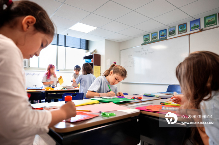 Children doing classwork in a classroom