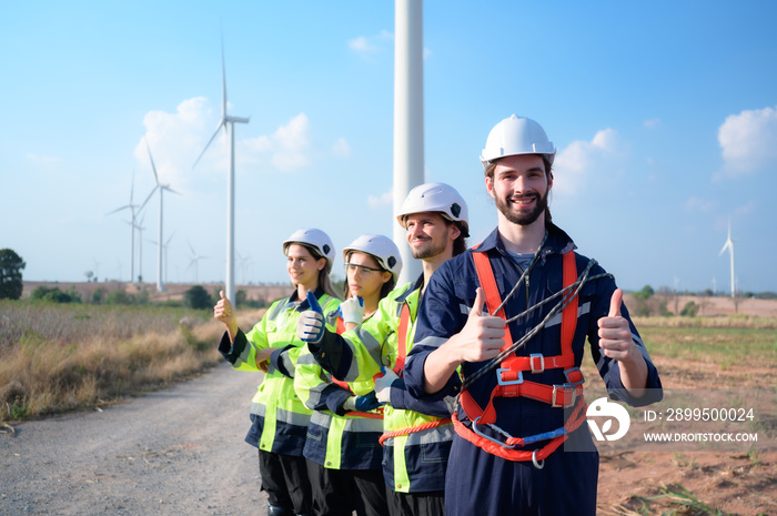 Portrait of engineer stationed at the Natural Energy Wind Turbine site. with daily audit tasks of major wind turbine operations that transform wind energy into electrical electricity