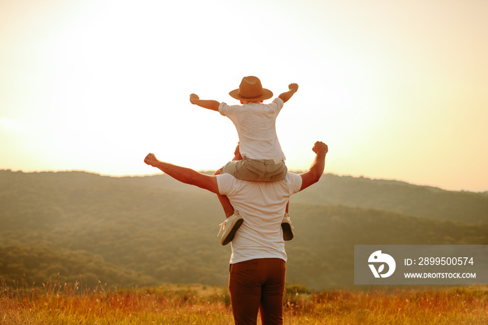 Father and son have fun in nature