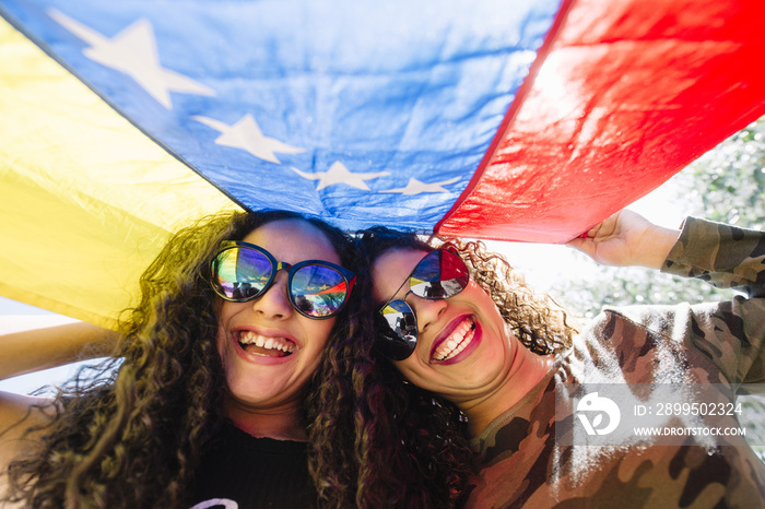 Young girls with flag of Venezuela