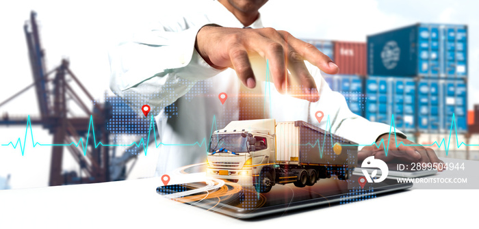 Businessman employing tablet for logistic network distribution and smart transportation, networking intelligent logistics of truck and container cargo ship, logistic import export, and industrial.