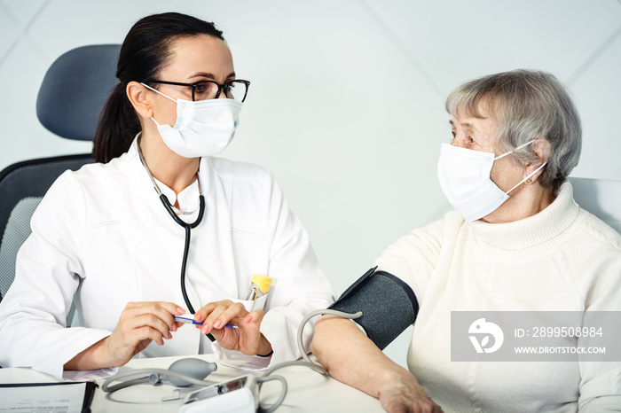 healthcare in hospital concept. female doctor consulting old lady