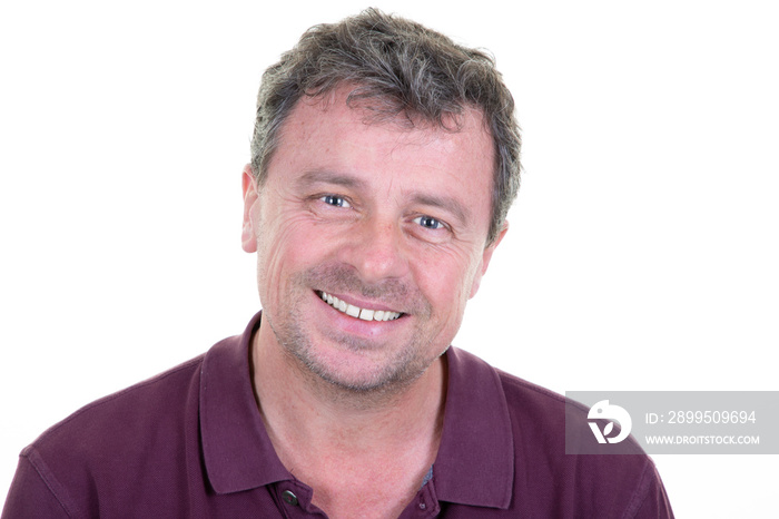 Portrait of happy handsome middle aged man smiling in white background