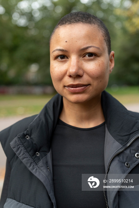 Portrait of woman in sports clothing in park