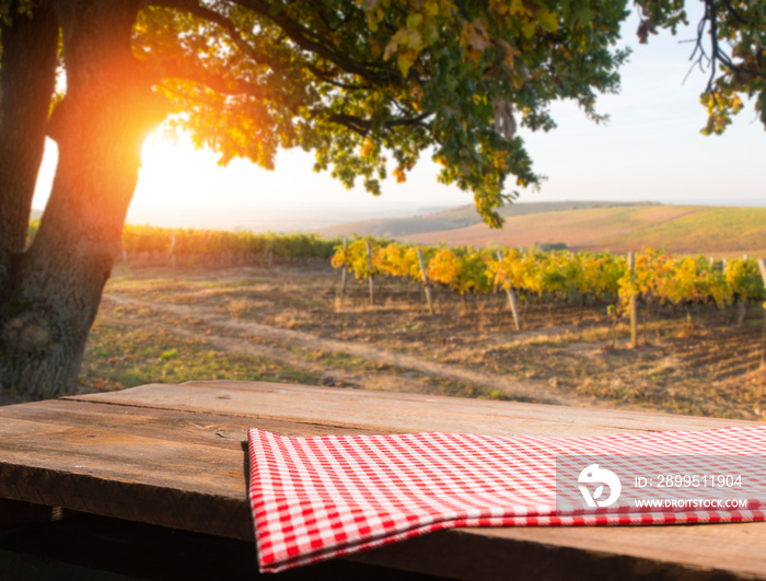 Landscape of Tuscany with desk of yellow wood