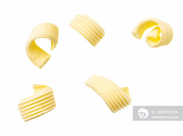 different butter curls or rolls isolated on white background. Top view.