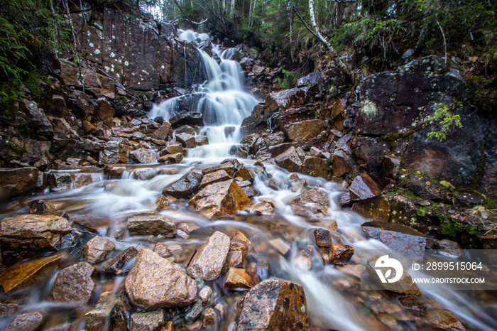 Rocky river waterfall in a forest