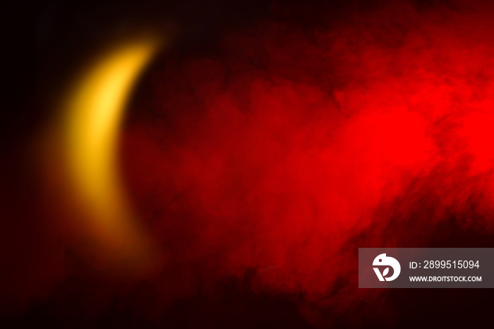 Red smoke and crescent-shaped light. Concept, an Islamic symbol.