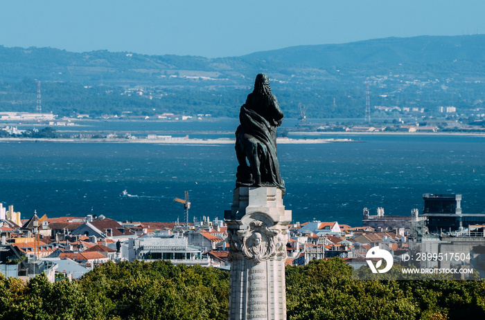 Eduardo VII park in Lisbon looking towards Marques de Pombal Statue in a beautiful summer day